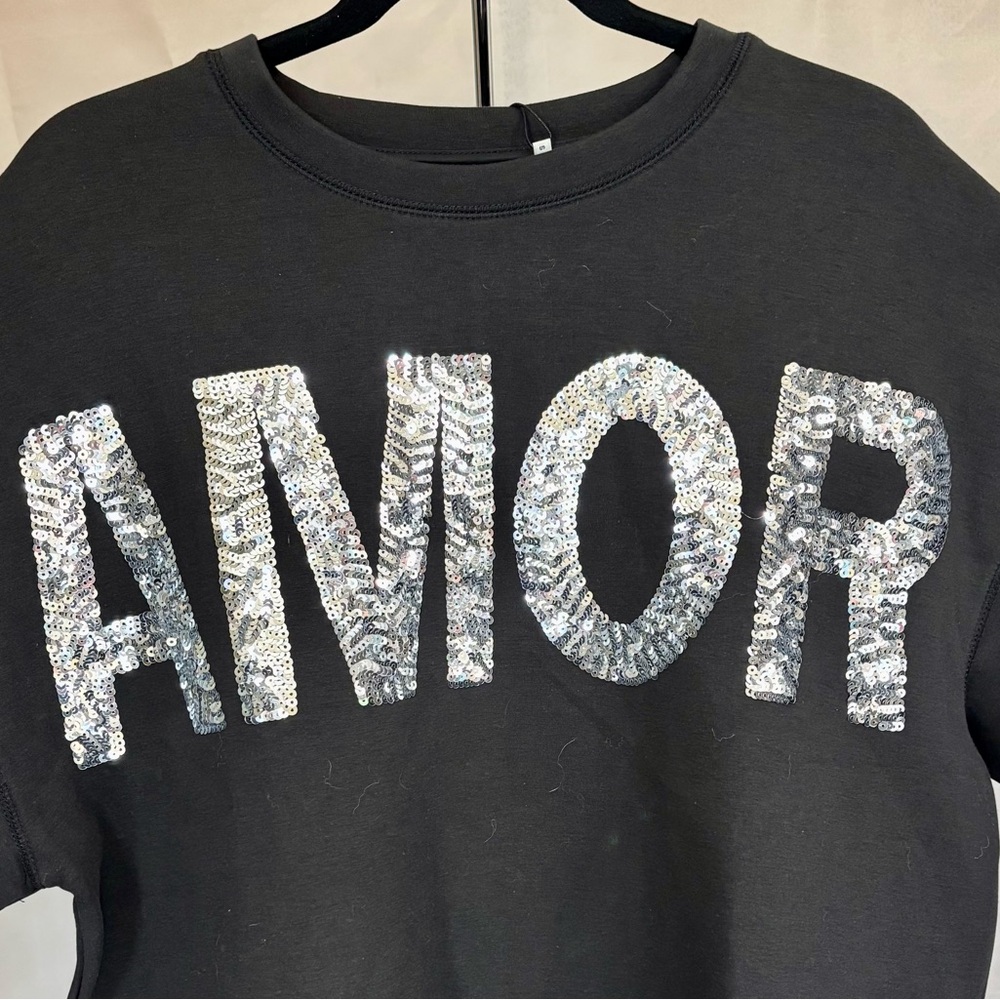 AMOR Off-the-Shoulder Sweater in Black with Silver Sequins